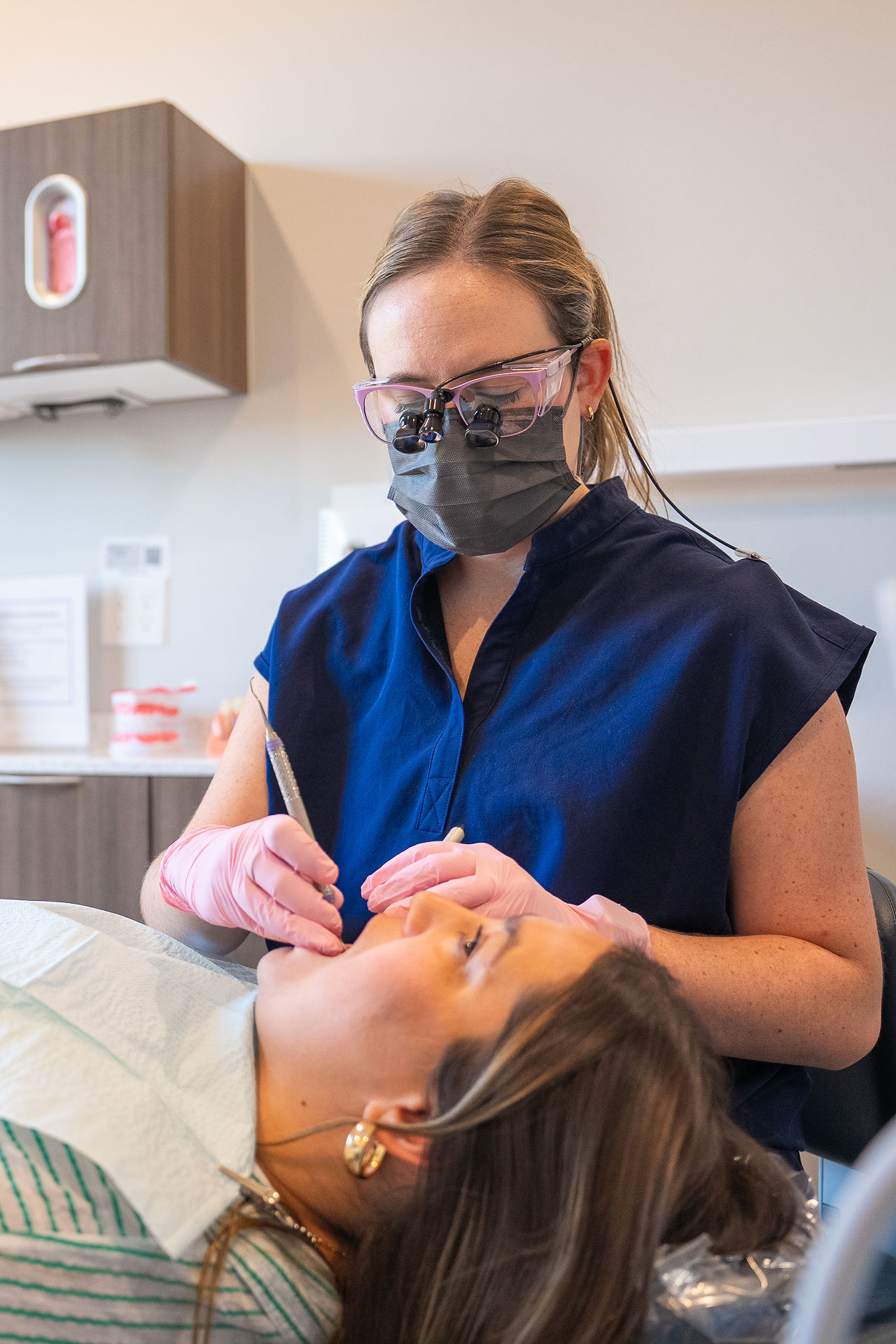 Dentist performing a dental examination