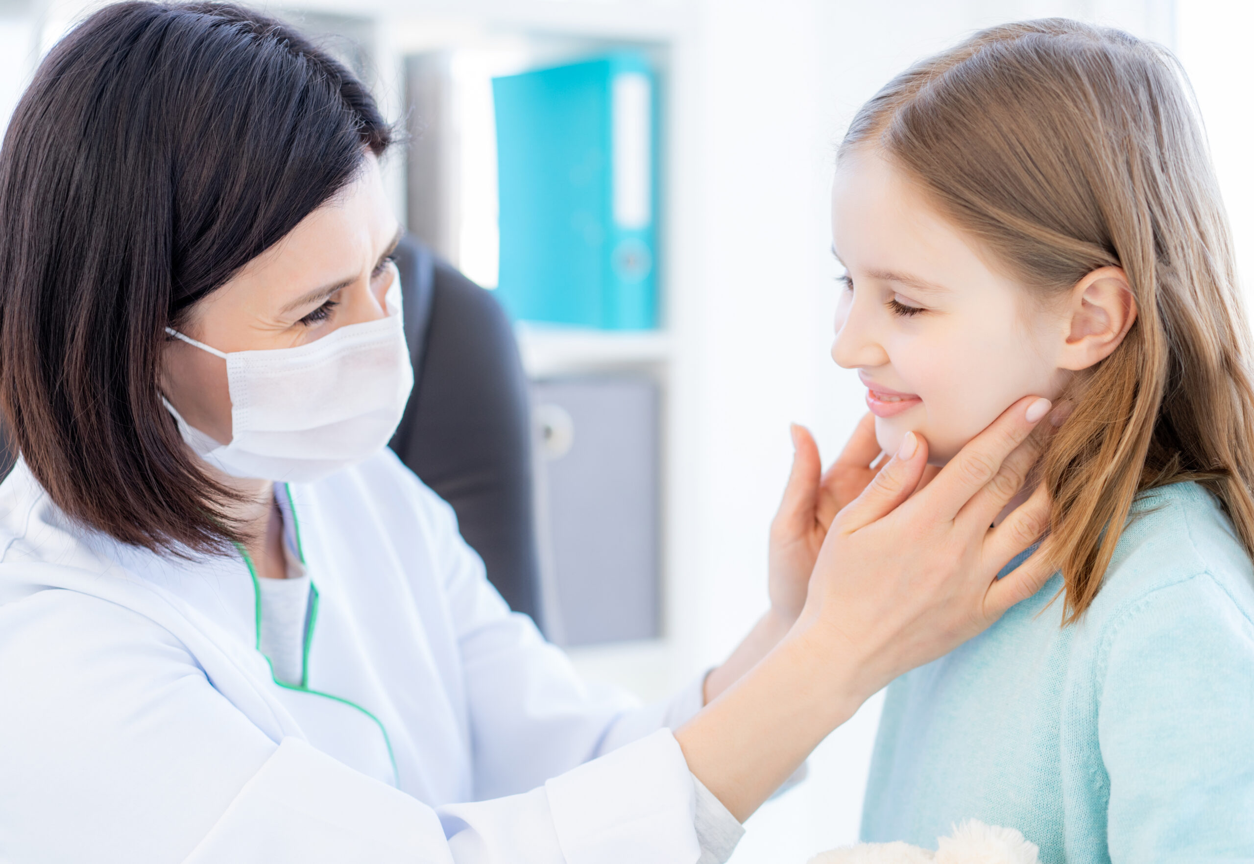 Child receiving an orthodontic and jaw development evaluation