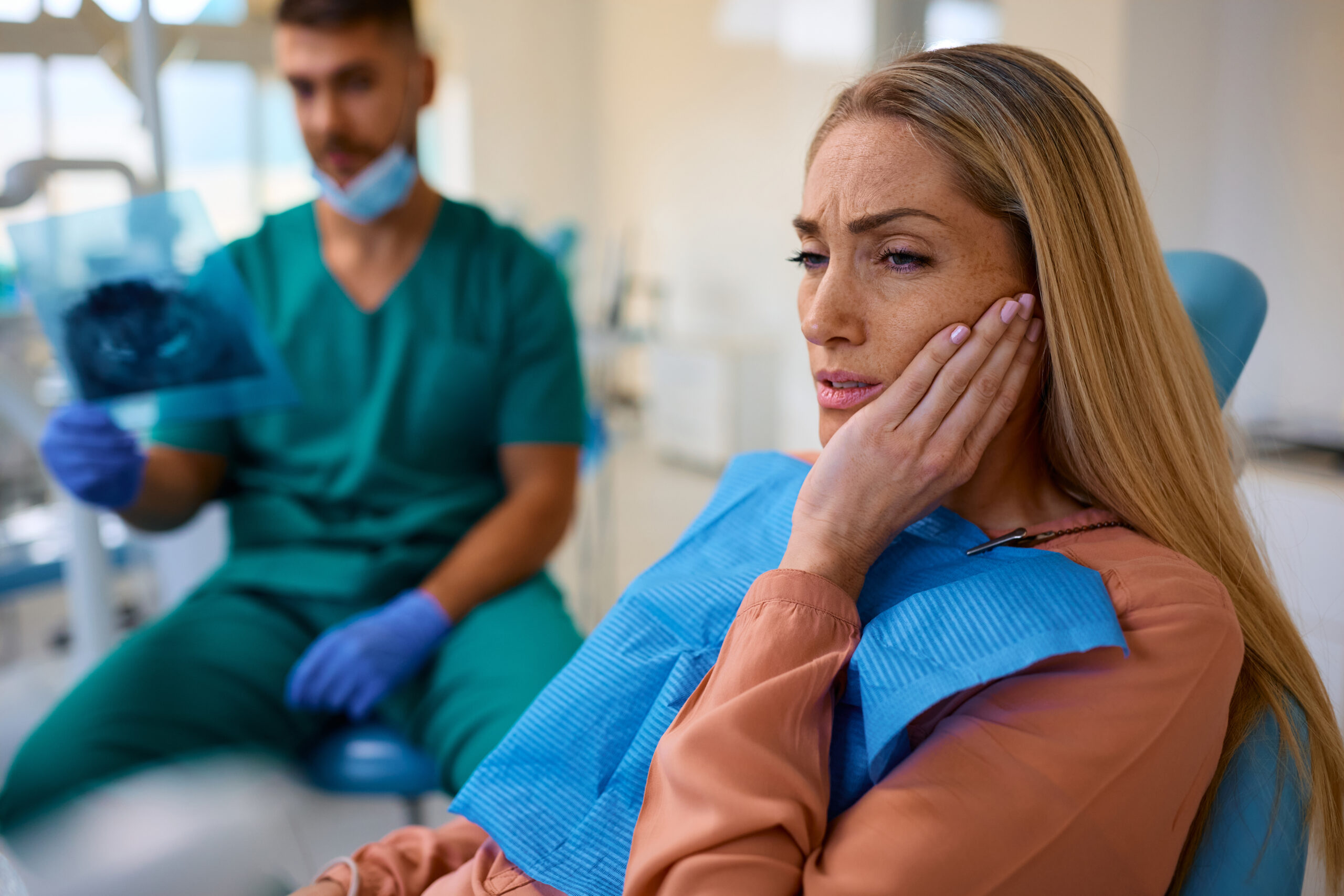 Patient experiencing persistent tooth pain