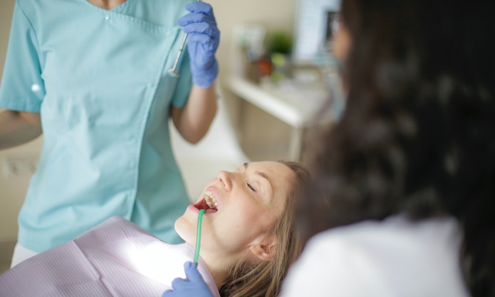 Patient receiving dental care related to dental implants