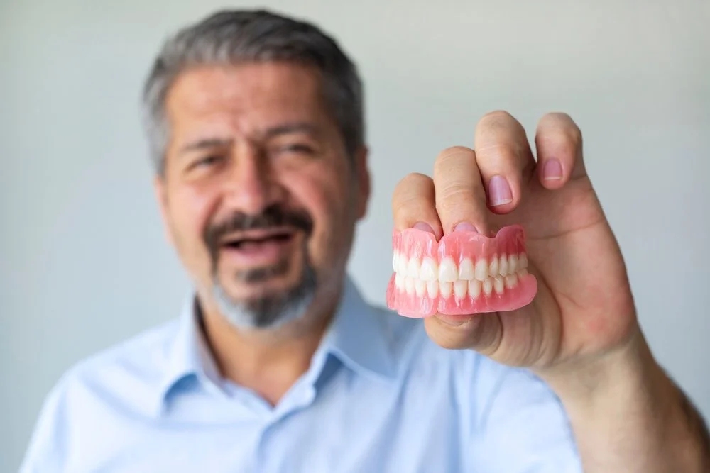 The Big Dental Debate: Temporary or Permanent Dentures?